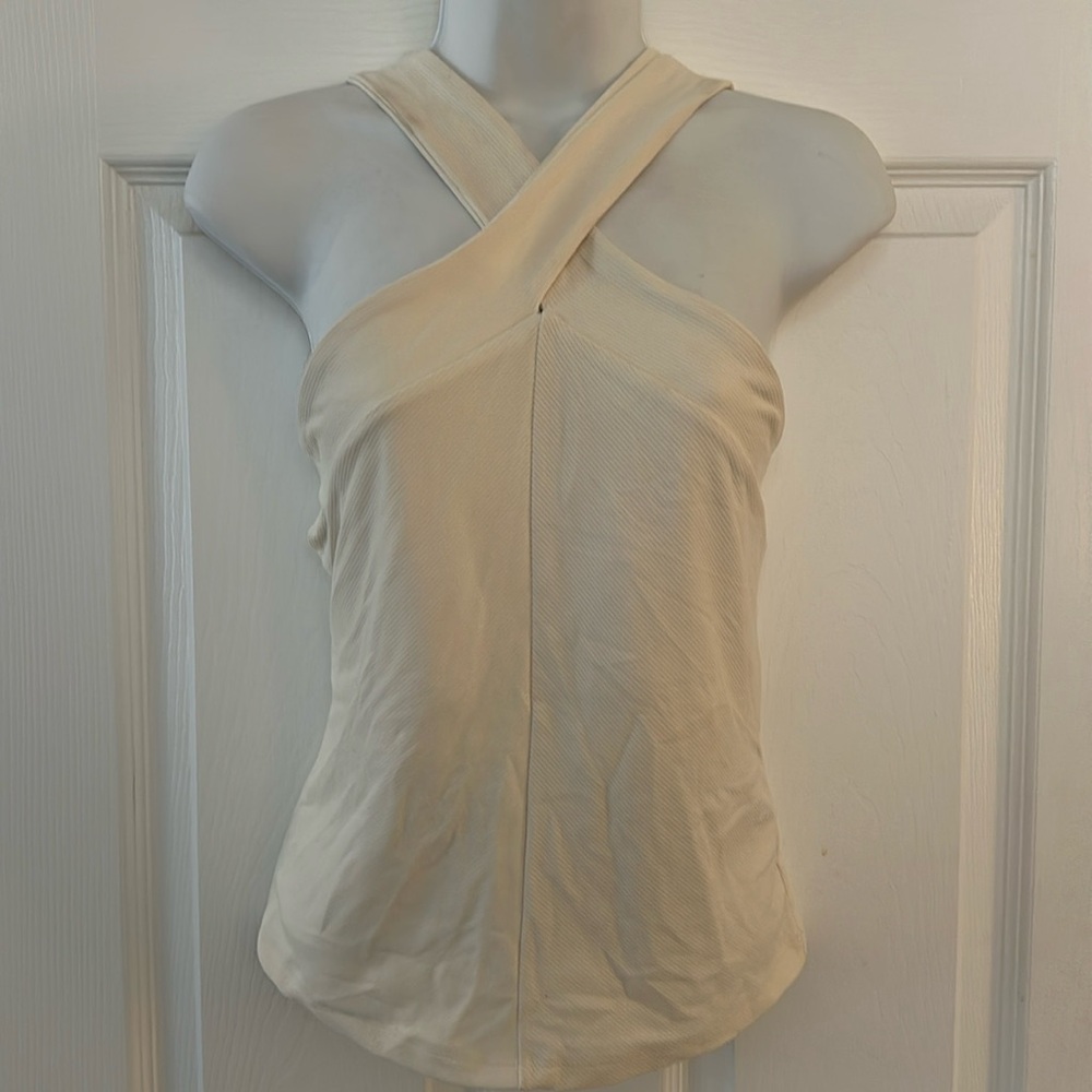 Brand new with tags, CALIA top size medium. color light cream with built-in bra.